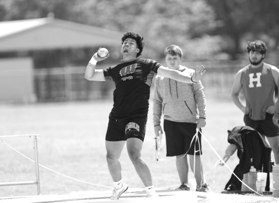 Angel Hernandez captured the District 13-3A crown in two events, hurling the discus 143 feet, 1/2 inch and putting the shot 44 feet, fourinches. He will compete April 19 at the Area meet at Atlanta vying for an appearance in the Region 2 meet set for April 28-29 at Whitehouse. Hernandez earned 20 of the varsity boys 185 team points on the way to a District championship. Photos by Shiela K. Haynes