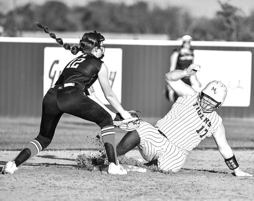 Carsyn-Sparks slides into second. Above, Friday against Winnsboro. Below, Cameron-Pope dives safely into third base against the Lady Raiders. Photo by Trey Pope