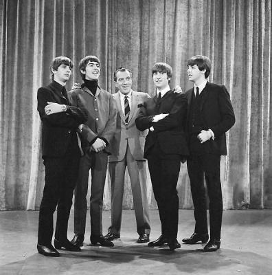 Photo of The Beatles with Ed Sullivan from their first appearance on Sullivan’s U.S. variety television program in February 1964. From left is Ringo Starr, George Harrison, Ed Sullivan, John Lennon, Paul McCartney. Courtesy photo