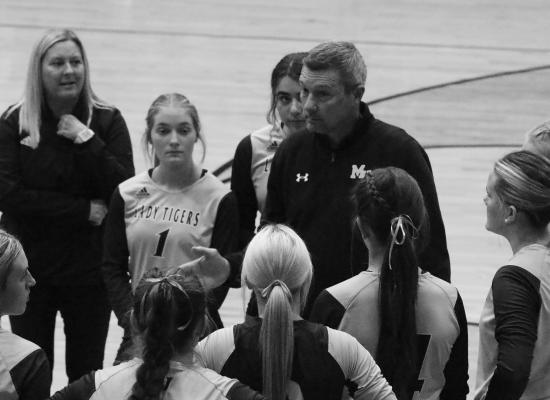 Lady Tigers Coach Joe Thomas talks to his team during a timeout. Photo by Allen D. Fisher