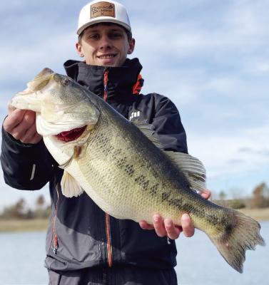 Kale Robinson with his personal best eight pound bass. Robinson died Saturday after he collapsed at a fishing tournament on Lake Cypress Springs. Courtesy photo