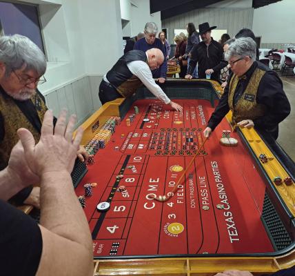 Friends of the Winnsboro Animal Shelter take to the tables during the annual casino night fundraiser. Photos by James Rasco