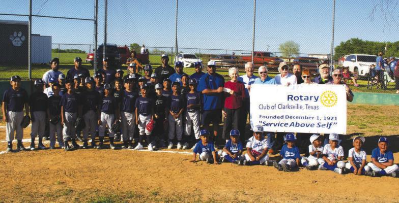 The Clarksville Rotary were there opening day of little league in Clarksville as they donated jerseys for several teams.