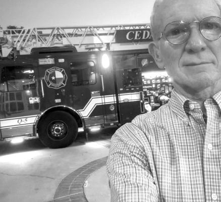 John Hicks with the firetruck in Cedar Park. Staff photo by John Hicks